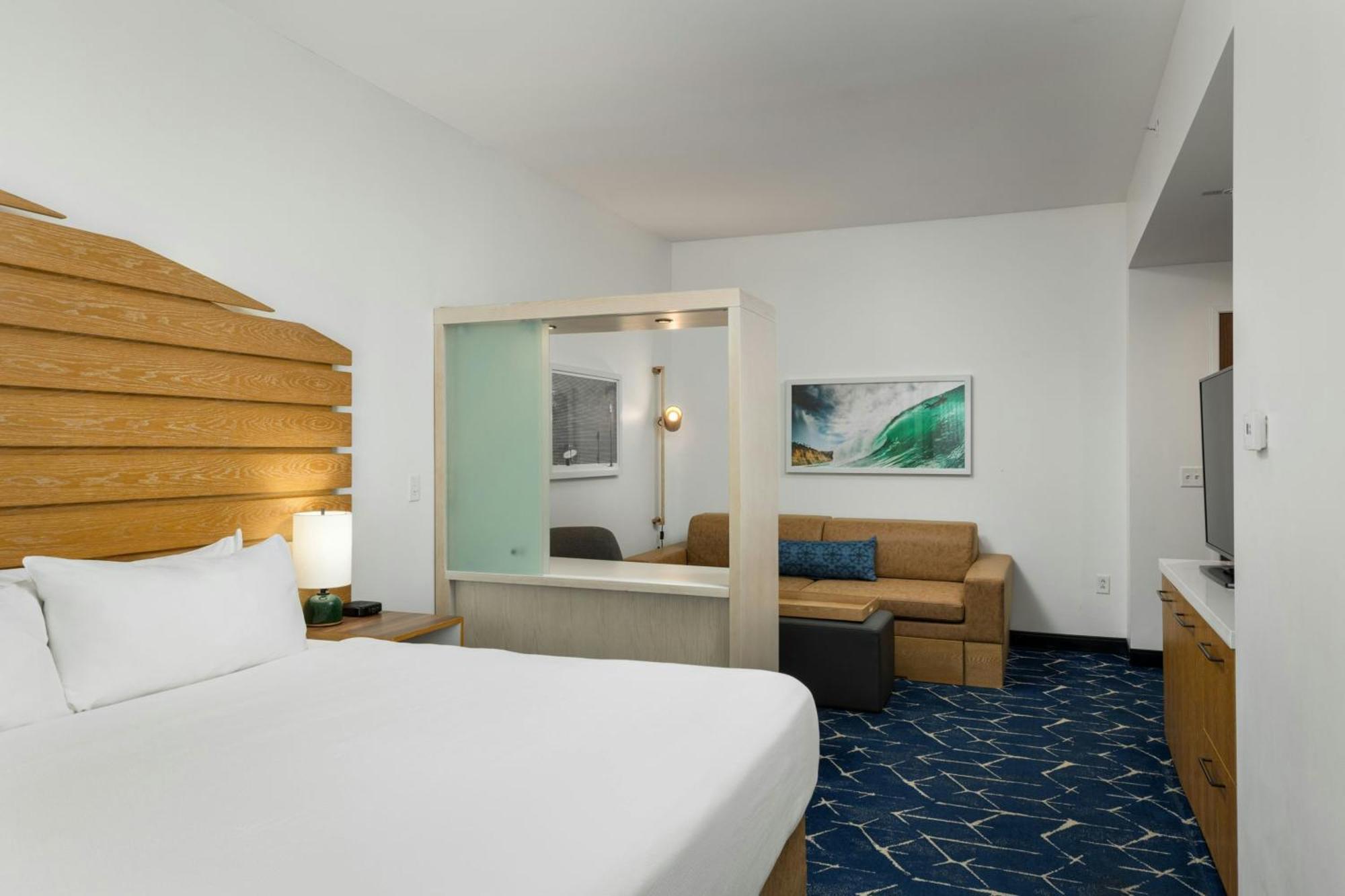 King Suite Partial Ocean View Roll Shower Trundle Sofa Balcony Mobility Access or Hearing Accessible