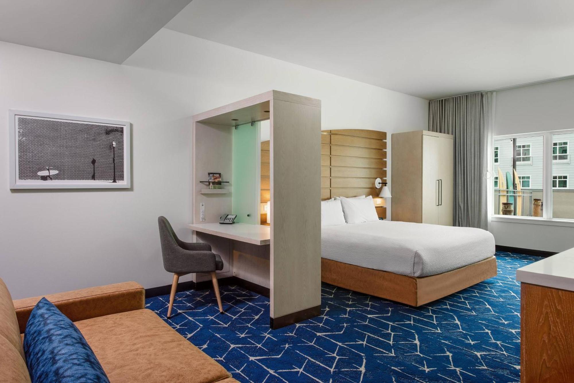 King Suite Partial Ocean View Roll Shower Trundle Sofa Balcony Mobility Access or Hearing Accessible