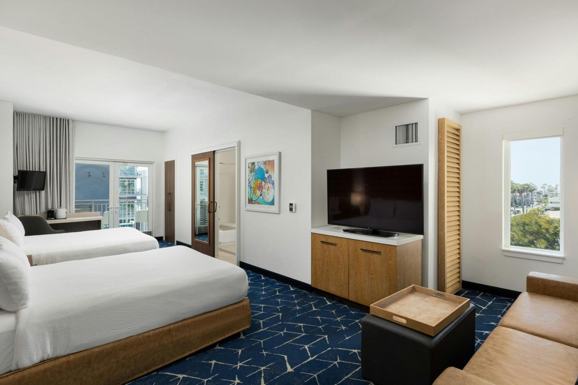 King Suite Partial Ocean View Roll Shower Trundle Sofa Balcony Mobility Access or Hearing Accessible